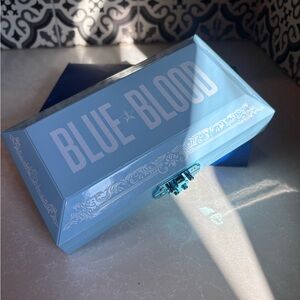 Jeffree Star Blue-Themed Eyeshadow Palette with Teal, Navy, Purple, Pink, Peach